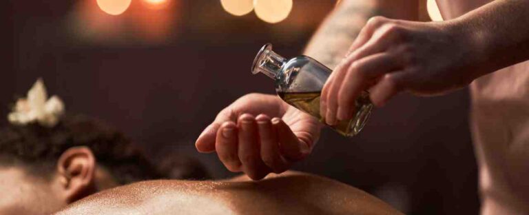 aromatherapy oil application during signature massage in Sandy, Utah